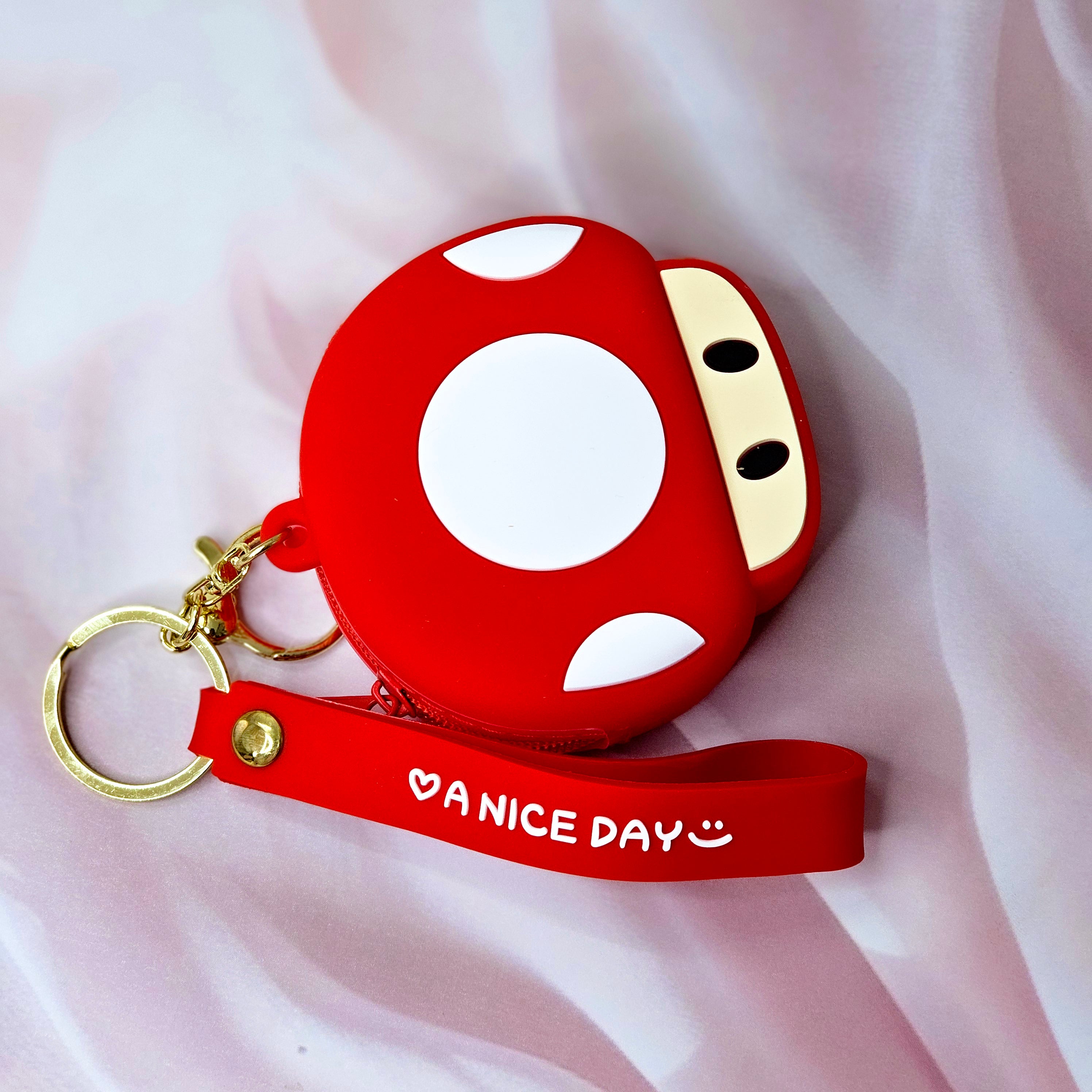 Durable silicone Tom character coin purse and keychain, a unique accessory for kids' bags or keys, combining style and utility. www.usmile.com